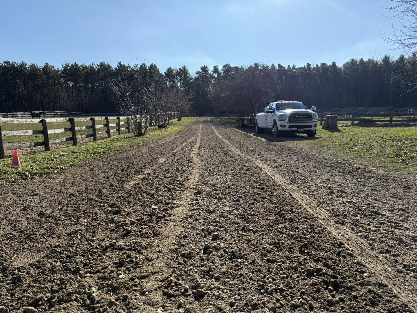 Rural farm lane undergoing decompaction and grading restoration